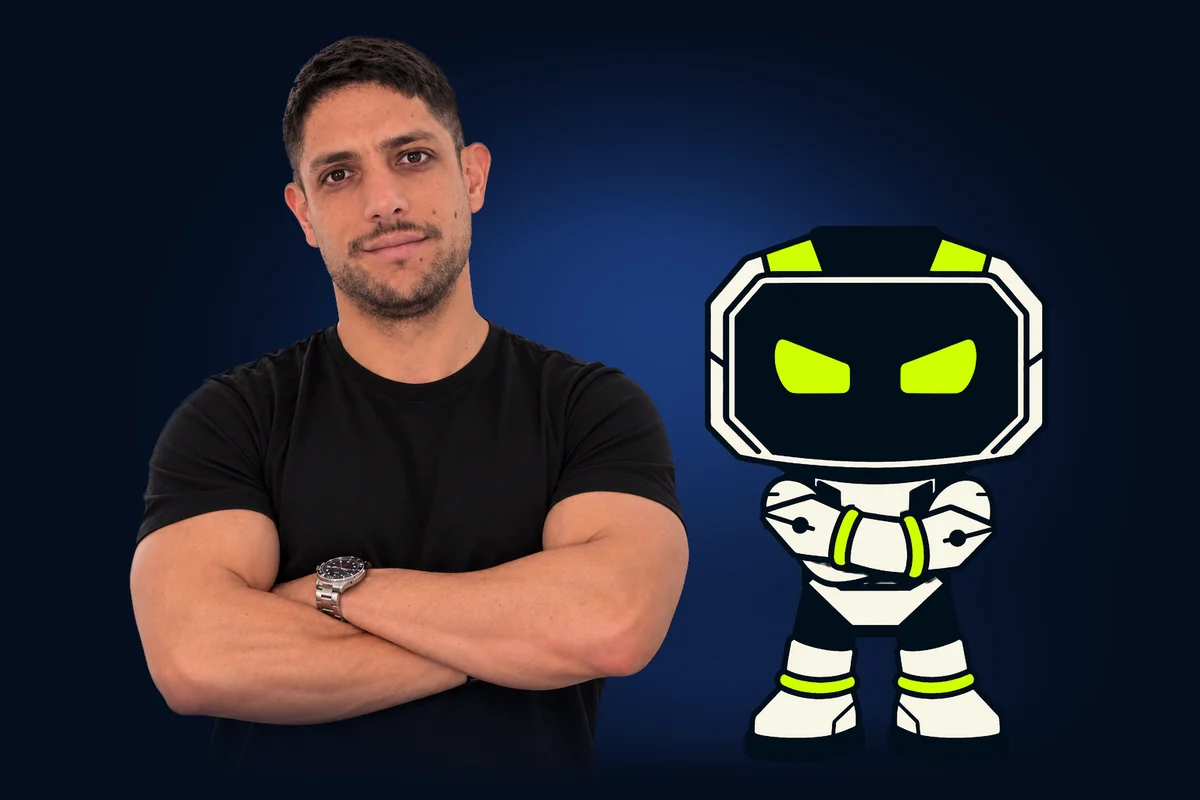 The founder of HagoDigital beside Hago the robot, both with arms crossed.